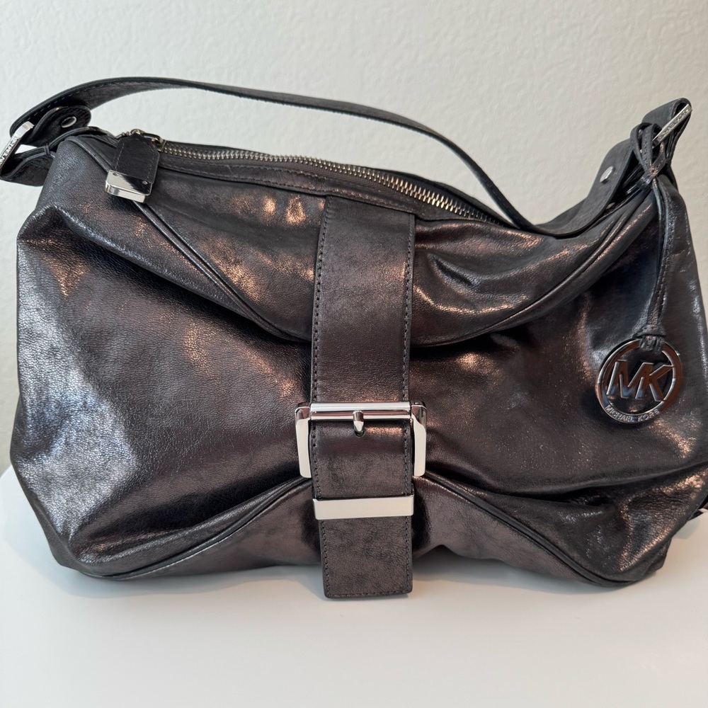 Michael Kors metallic hobo bag. Never used.